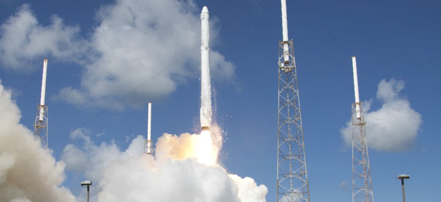 The SpaceX Falcon 9 rocket and Dragon spacecraft lifts off from Space Launch Complex 40 at the Cape Canaveral Air Force Station.