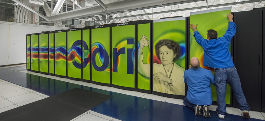 NERSC’s Cray Cori supercomputer’s graphic panels being installed at Wang Hall.