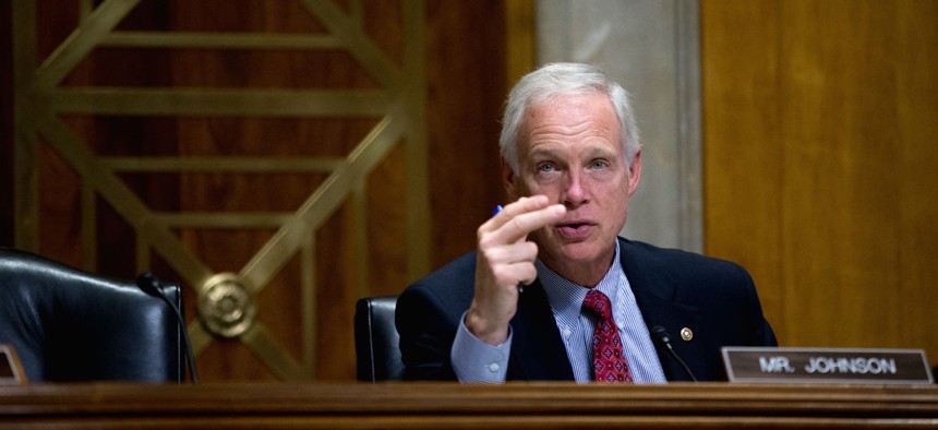 Senate Foreign Relations Committee member Sen. Ron Johnson, R-Wis., questions Deputy Assistant Secretary of State Benjamin Ziff, on Capitol Hill in Washington, Tuesday, Nov. 3, 2015, during the committee's hearing entitled: "Putin's Invasion of Ukraine an