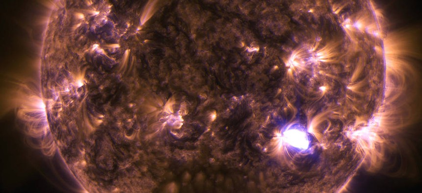The sun emitting potentially dangerous solar flares.
