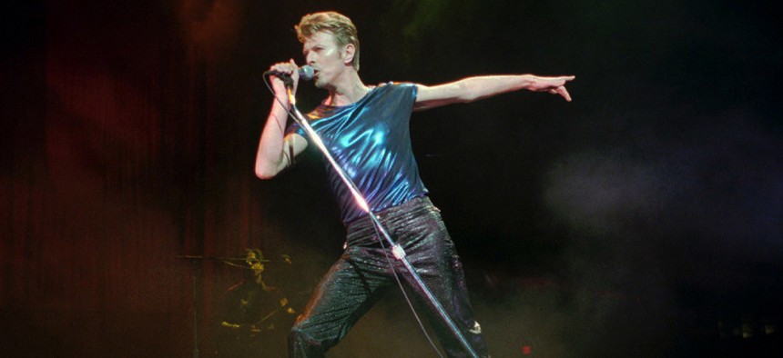 In this Sept. 14, 1995, photo, David Bowie performs in Hartford, Conn.