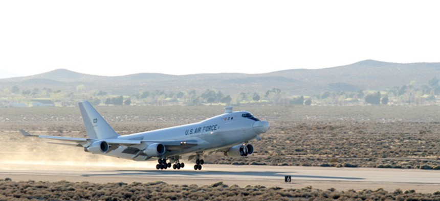 The YAL-1A Airborne Laser, a modified Boeing 747-400F, takes off from Edwards Air Force Base, California, on March 15 for a five-hour test mission.