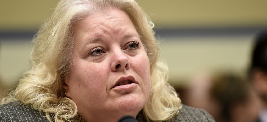 Office of Personnel Management (OPM) Chief Information Officer Donna K. Seymour testifies on Capitol Hill in Washington, Wednesday, June 24, 2015, before the House Oversight and Government Reform Committee hearing on recent cyber attacks. The OPM is under