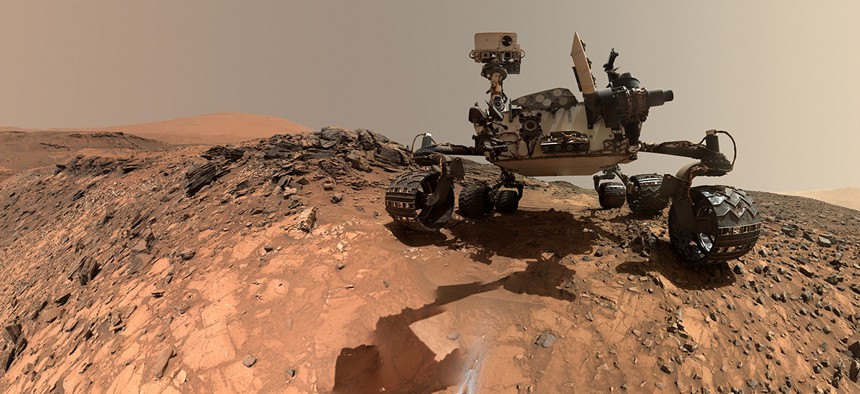 NASA's Curiosity Rover explores Martian landscape.