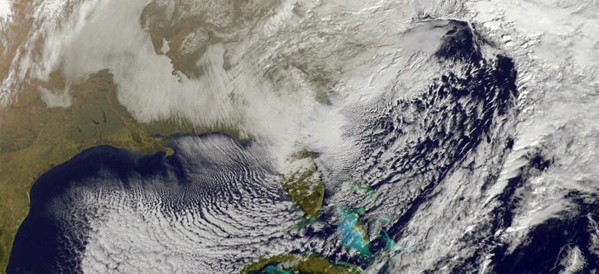 This image taken by NOAA's GOES-East satellite on Saturday, Jan. 23, 2016, shows a large winter snowstorm over the East Coast of the United States.