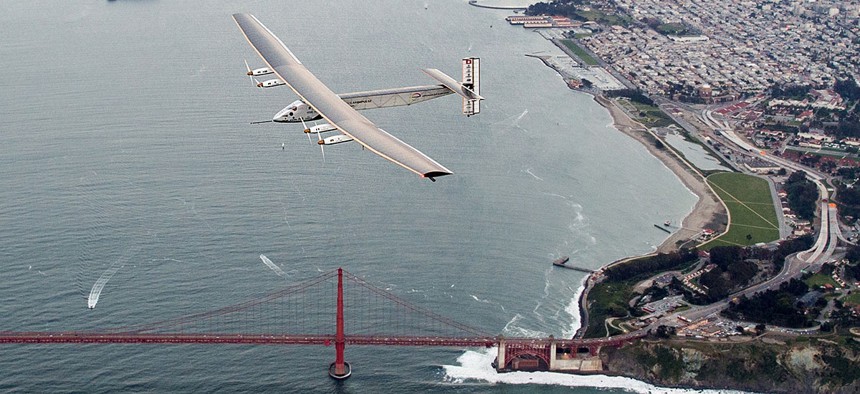 Solar Impulse 2 flies over the Golden Gate Bridge in San Francisco, Saturday, April 23, 2016. 