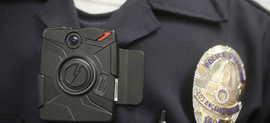 A Los Angeles Police officer wears an on-body camera during a demonstration.