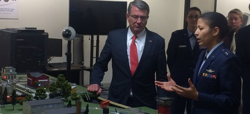 Defense Secretary Ash Carter looks over the CberCity simulator at the Air Force Academy, taken May 12, 2016.