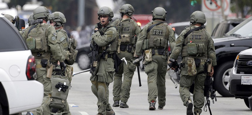 An FBI SWAT team arrives at the scene of a fatal shooting at the University of California, Los Angeles.
