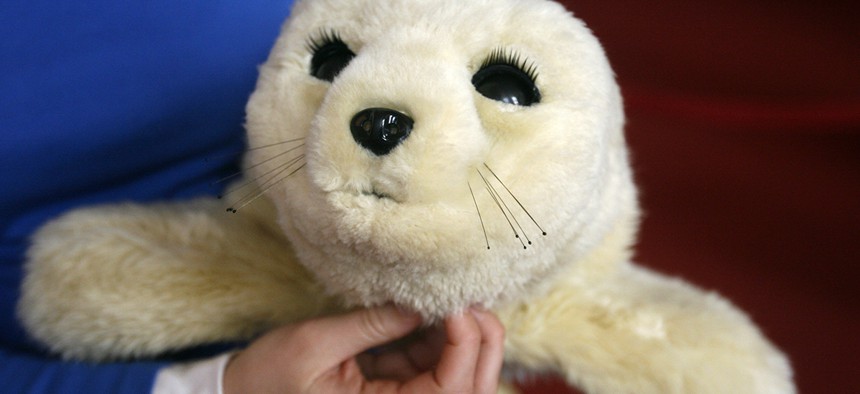 Paro, a therapeutic seal robot that reacts to human touch