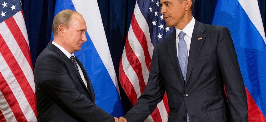 resident Barack Obama shakes hands with Russian President President Vladimir Putin