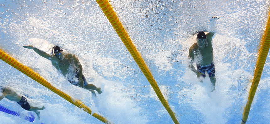United States' Nathan Adrian, right, and France's Florent Manaudou compete in a semifinal of the men's 50-meter freestyle during the swimming competitions of the 2016 Summer Olympics in Rio de Janeiro.