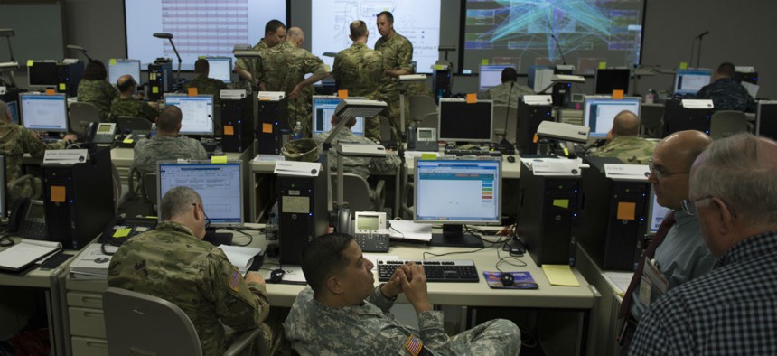 Participants at Cyber Guard 2016 works through a training scenario during the nine-day exercise Suffolk, Va., June 16, 2016.