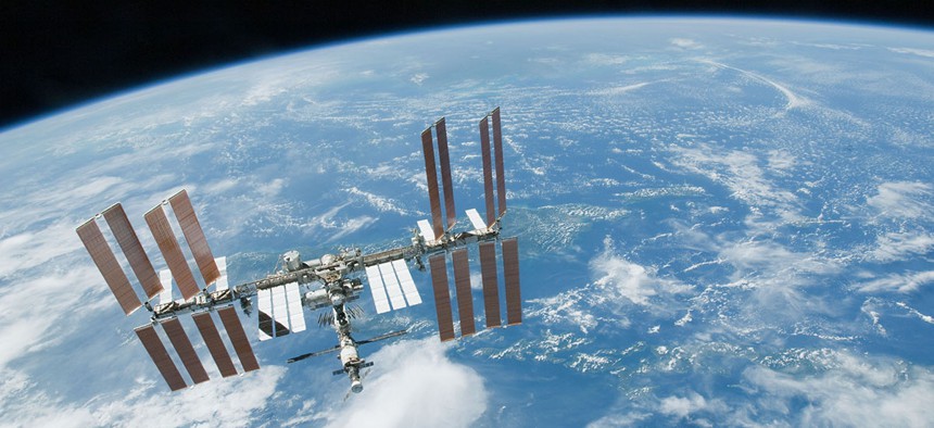 The International Space Station flies over Earth.