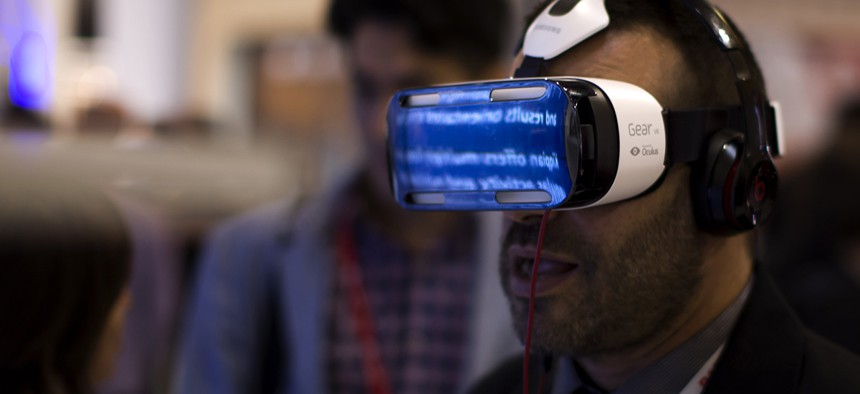 A visitor uses a Samsung virtual reality glasses during the Mobile World Congress Wireless show.