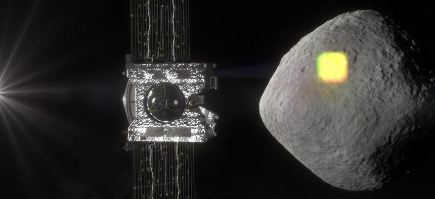 This artist's rendering made available by NASA in July 2016 shows the mapping of the near-Earth asteroid Bennu by the OSIRIS-REx spacecraft. 