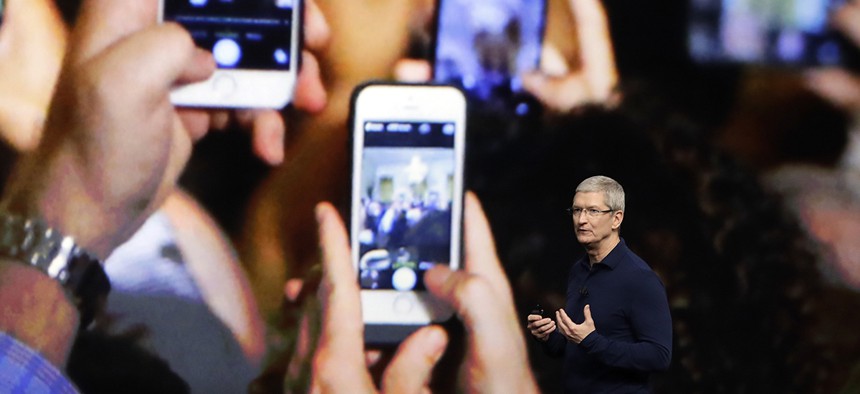 Apple CEO Tim Cook announces the new iPhone 7 during an event to announce new products Wednesday, Sept. 7, 2016, in San Francisco. 