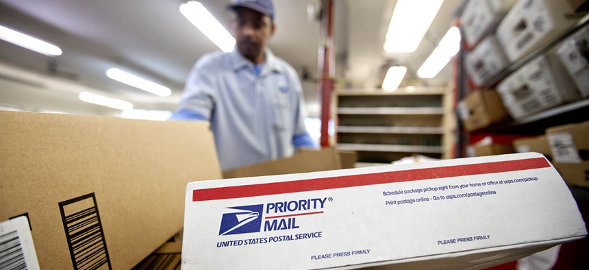 Packages wait to be sorted in a Post Office.
