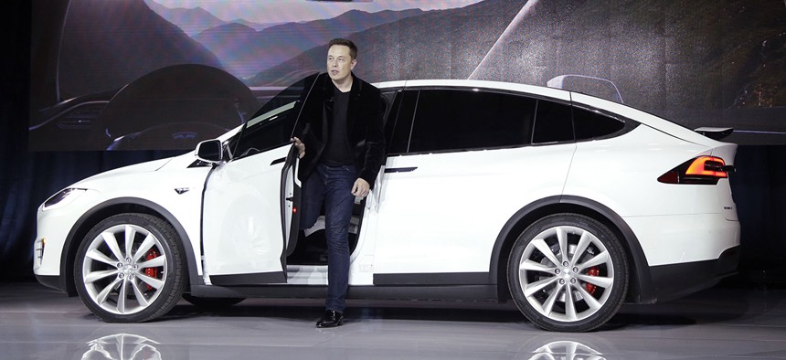 Elon Musk, CEO of Tesla Motors Inc., introduces the Model X car at the company's headquarters in Fremont, Calif. 