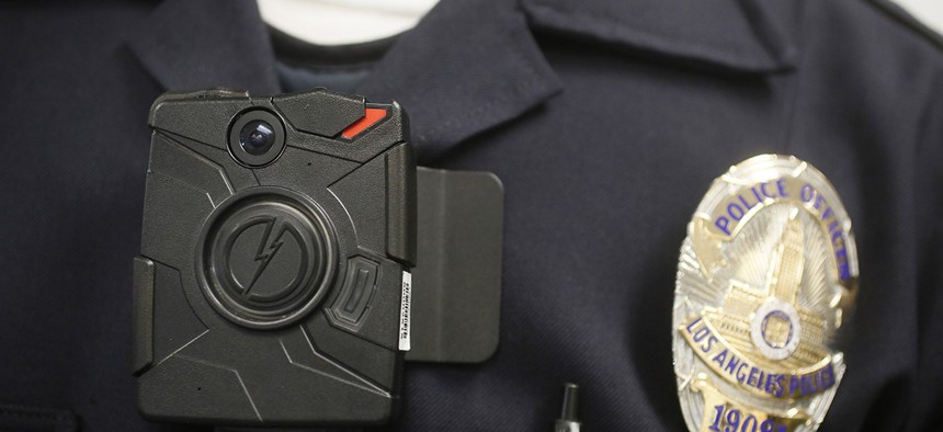 A Los Angeles Police officer wears an on-body camera during a demonstration in Los Angeles.