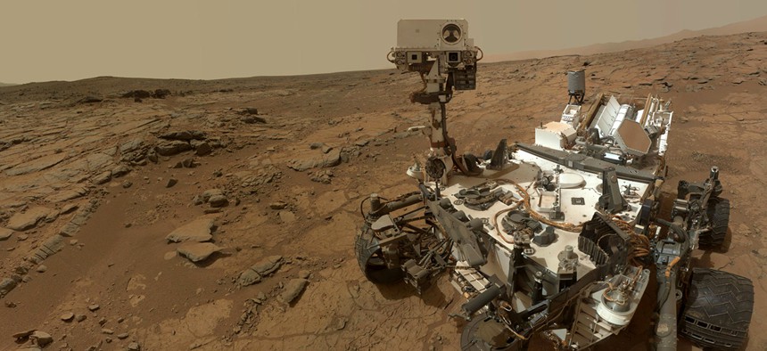 The Curiosity Rover on the surface of Mars.