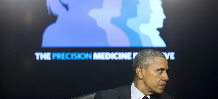 President Barack Obama on stage during a panel discussion as part of the White House Precision Medicine Initiative.