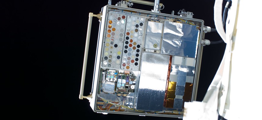 Experiment sample trays on MISSE-8 attached to the exterior of the International Space Station in 2013. These trays held the ionic liquid epoxy samples that could help build composite cryogenic tanks for future spacecraft.