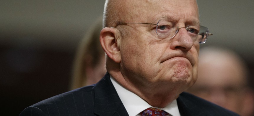 Director of National Intelligence James Clapper listens while testifying on Capitol Hill in Washington, Thursday, Jan. 5, 2017.