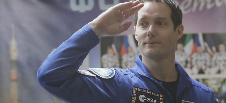 French astronaut Thomas Pesquet, member of the main crew to the International Space Station, gestures after a news conference in Russian leased Baikonur cosmodrome, Kazakhstan