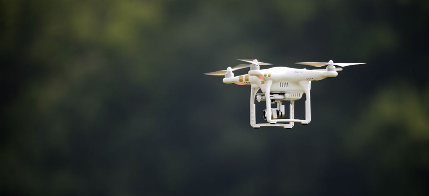 A DJI Phantom 3 drone is flown during a drone demonstration.