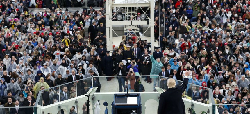 President Donald Trump waves to the crowd after speaking during the 58th Presidential Inauguration at the U.S. Capitol in Washington, Friday, Jan. 20, 2017.