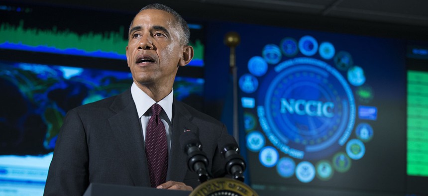 Former president Barack Obama speaks at the National Cybersecurity and Communications Integration Center in Arlington, Va.