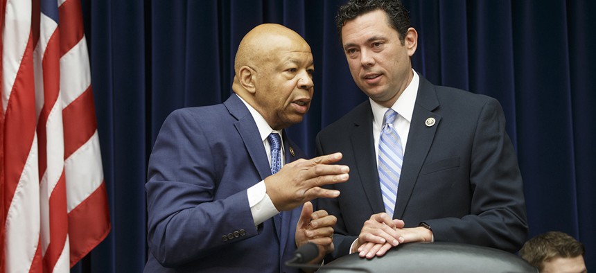 House Oversight and Government Reform Committee Chairman Rep. Jason Chaffetz, R-Utah, right, confers with the committee's ranking member Rep. Elijah Cummings, D-Md.