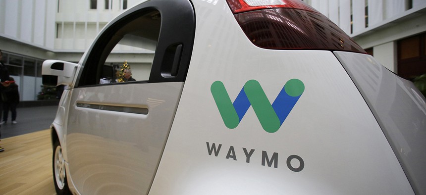 The Waymo driverless car is displayed during a Google event