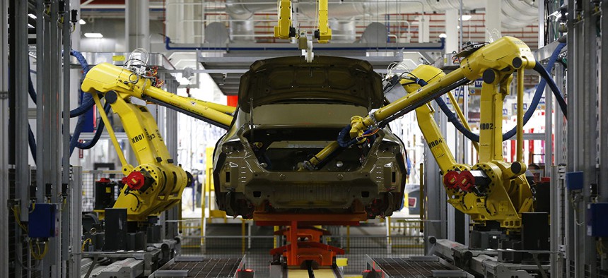 Automated robots build a 2015 Chrysler 200 at the Sterling Heights Assembly Plant in Sterling Heights, Mich.