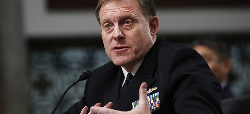U.S. Cyber Command and the National Security Agency Director Adm. Mike Rogers testifies on Capitol Hill in Washington.