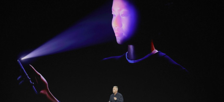 Phil Schiller, Apple's senior vice president of worldwide marketing, announces features of the new iPhone X at the Steve Jobs Theater on the new Apple campus on Tuesday, Sept. 12, 2017.
