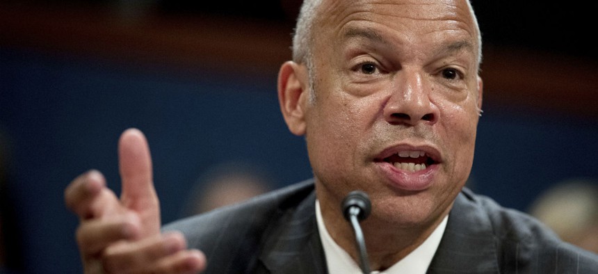 Former Homeland Security Secretary Jeh Johnson testifies to the House Intelligence Committee task force on Capitol Hill