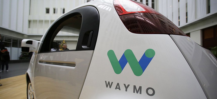The Waymo driverless car is displayed during a Google event, in San Francisco.