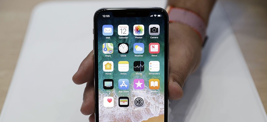 The new iPhone X is displayed in the showroom after the new product announcement at the Steve Jobs Theater on the new Apple campus in Cupertino, Calif.
