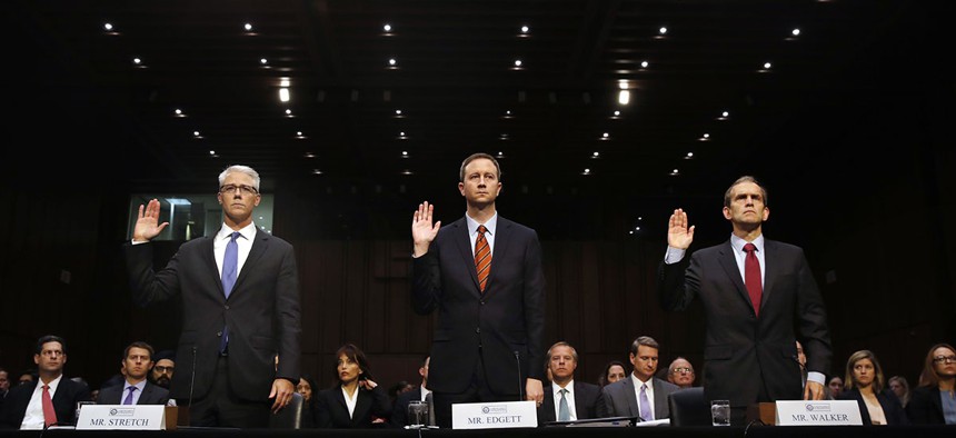 From left, Facebook's General Counsel Colin Stretch, Twitter's Acting General Counsel Sean Edgett, and Google's Senior Vice President and General Counsel Kent Walker, are sworn in for a Senate Intelligence Committee hearing on Russian election activity.