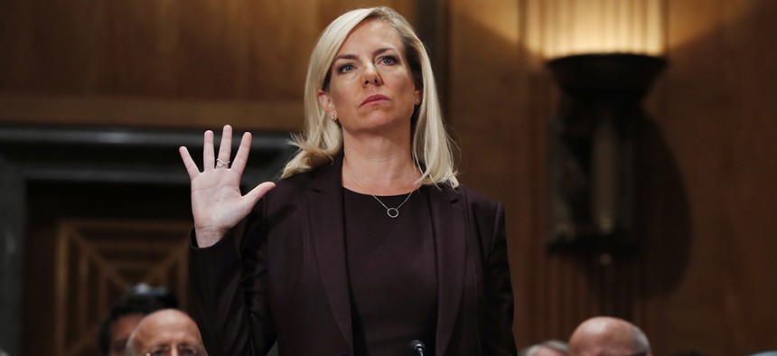 Kirstjen Nielsen is sworn in at a hearing on her nomination to be Department of Homeland Security Secretary.