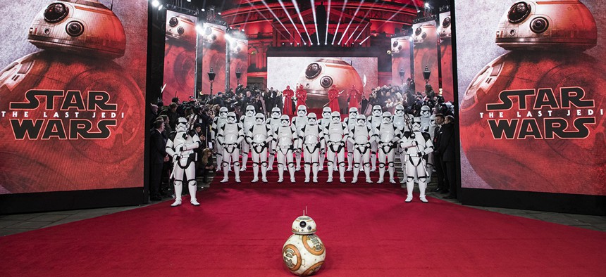BB-8 and Stormtroopers pose for photographers ahead of the premiere of the film 'Star Wars: The Last Jedi' in London, Tuesday, Dec. 12th, 2017. 