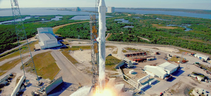 The SpaceX Falcon 9 rocket with the Dragon spacecraft launches from Space Launch Complex 40 at Cape Canaveral, Fla., on Friday, Dec. 15, 2017. 