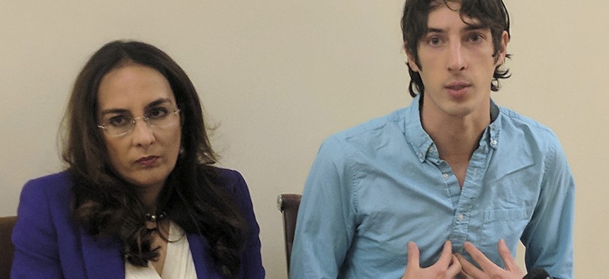 James Damore, right, a former Google engineer fired in 2017, speaks at a news conference while his attorney, Harmeet Dhillon, listens, Monday, Jan. 8, 2018, in San Francisco.  