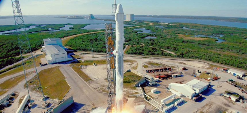 The SpaceX Falcon 9 rocket with the Dragon spacecraft launches from Space Launch Complex 40 at Cape Canaveral, Fla., on Friday, Dec. 15, 2017.