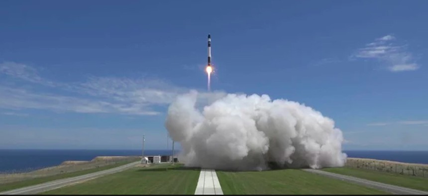 A Rocket Lab Electron booster lifts off from the company's Māhia Peninsula launch site in New Zealand on Jan. 21, 2018. The Electron rocket carried three small satellites into orbit for Rocket Lab customers.