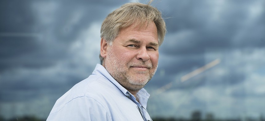 Eugene Kaspersky, Russian antivirus programs developer and chief executive of Russia's Kaspersky Lab, poses for a photo on a balcony at his company's headquarters in Moscow, Russia, Saturday, July 1, 2017. 