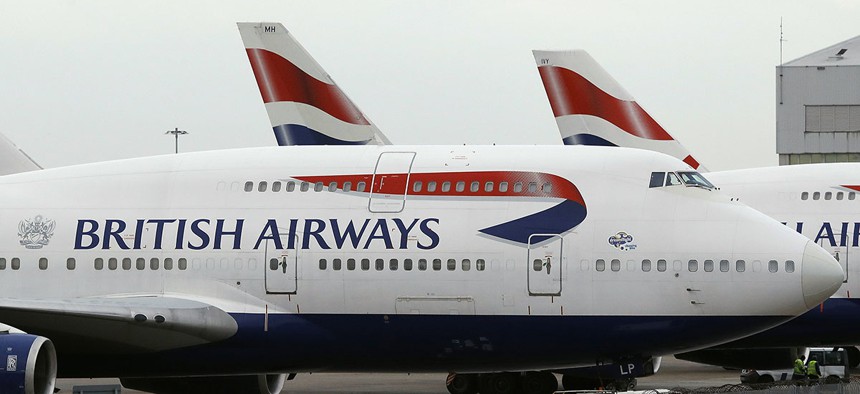 British Airways planes are parked at Heathrow Airport.
