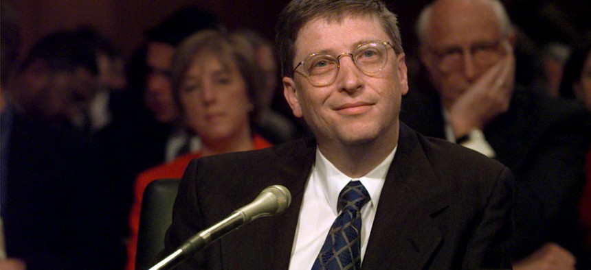 Microsoft President Bill Gates prepares to testify on Capitol Hill Tuesday, March 3, 1998.